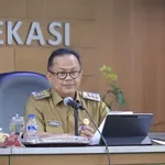 Pj Wali Kota Bekasi Gani Muhamad Berhentikan Jabatan Kepala Dinas Tersangka Kasus Korupsi Banprov DKI Jakarta